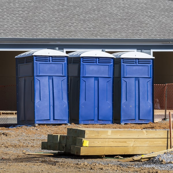 what is the cost difference between standard and deluxe porta potty rentals in Bruno